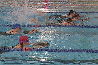 Athletes swimming