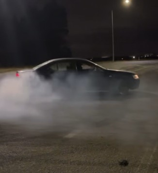Car doing a powerslide burnout