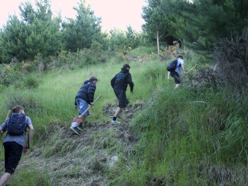 Youth volunteering to build bike tracks