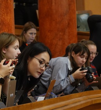 Youth Press Gallery members taking photos. 