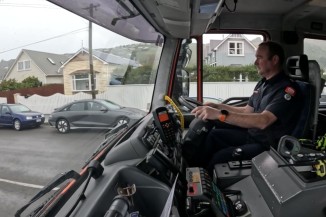 Sumner firefighter in a firetruck