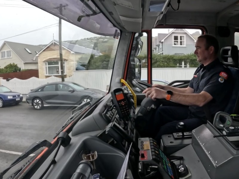 Sumner firefighter in a firetruck