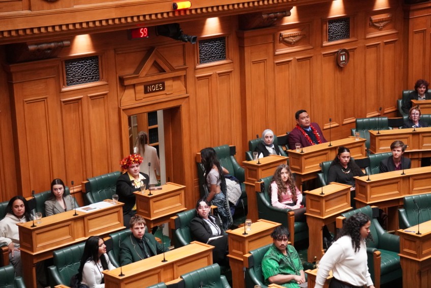 Youth MPs walking out of Parliament in response to speech