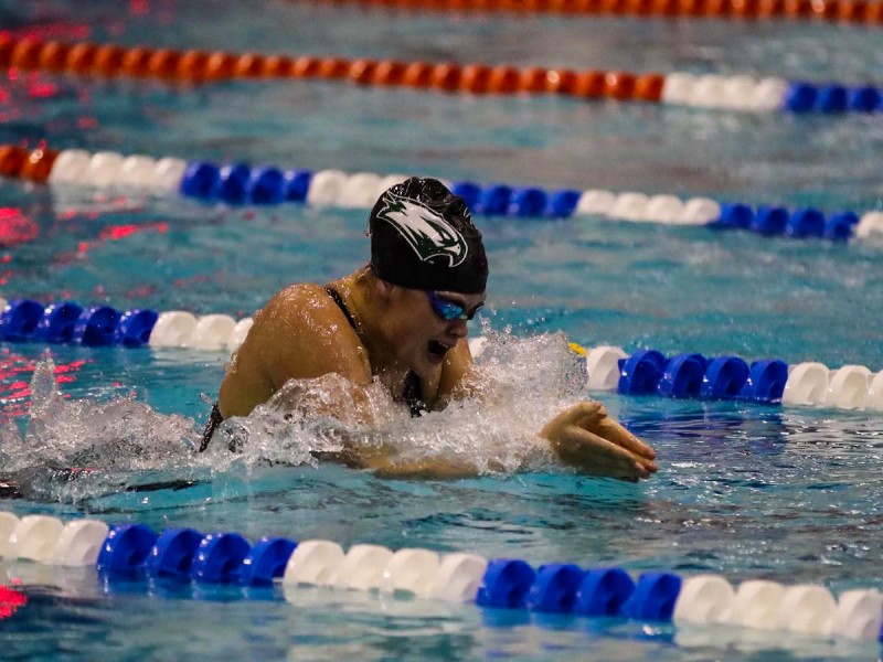 Ellie Eastwood at a swim competition competing for Wagner University 